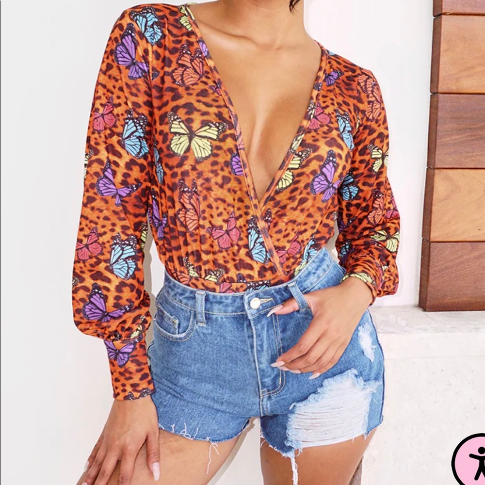Orange butterfly bodysuit top